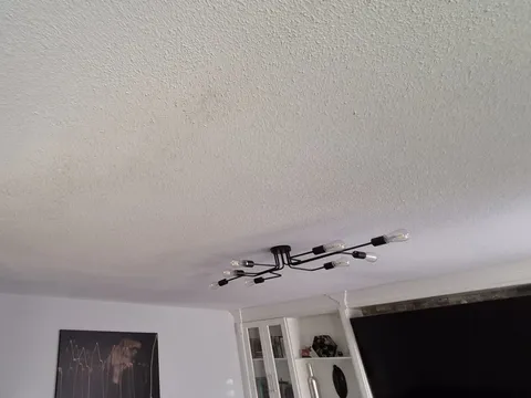 After: Same ceiling with the patches texture-blended to match the rest of the room